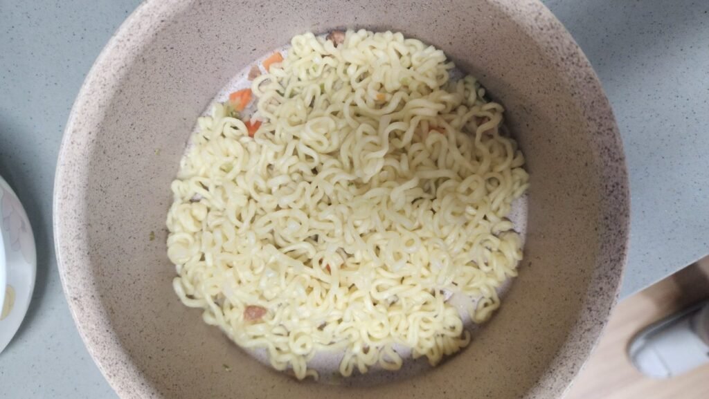 Drained noodles separated from cooking water