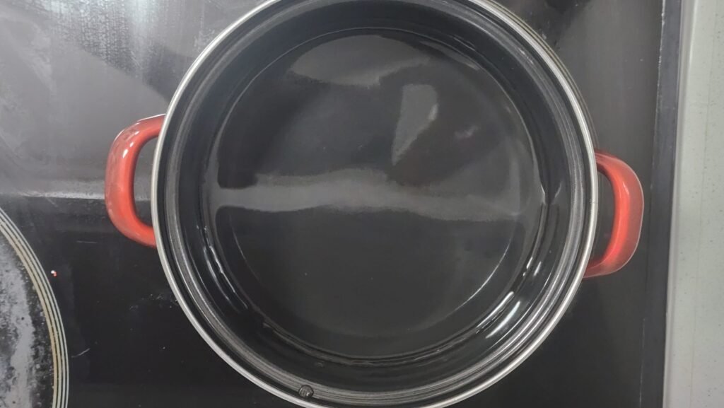 Boiling 500ml water in a small pot for Korean egg drop soup