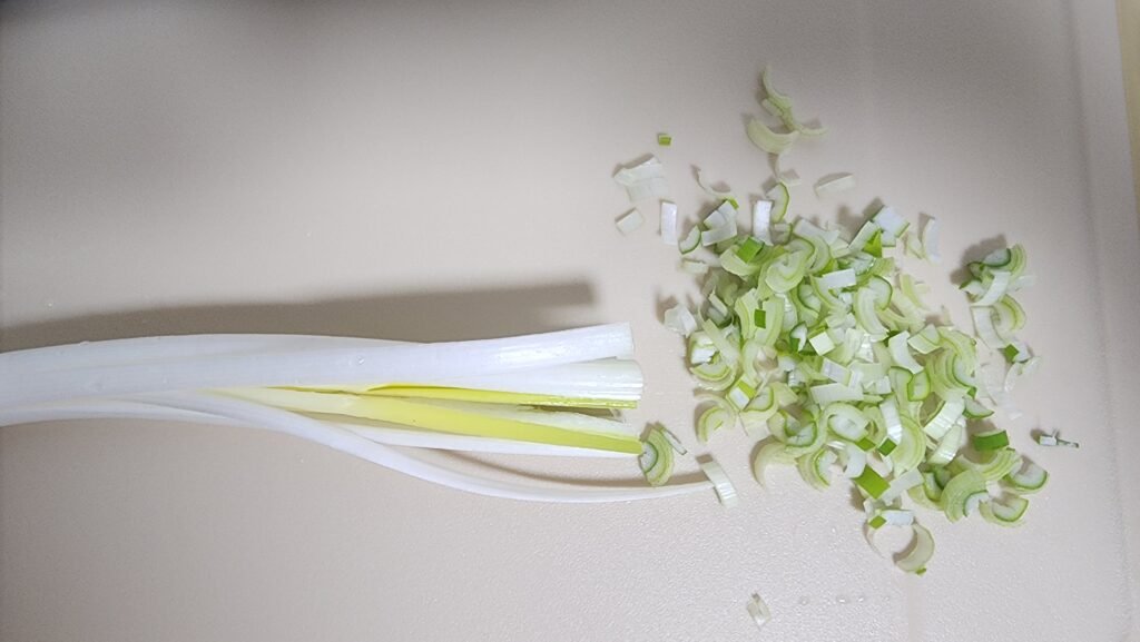 Finely chopped scallion, onion, and carrot for tteokgalbi.