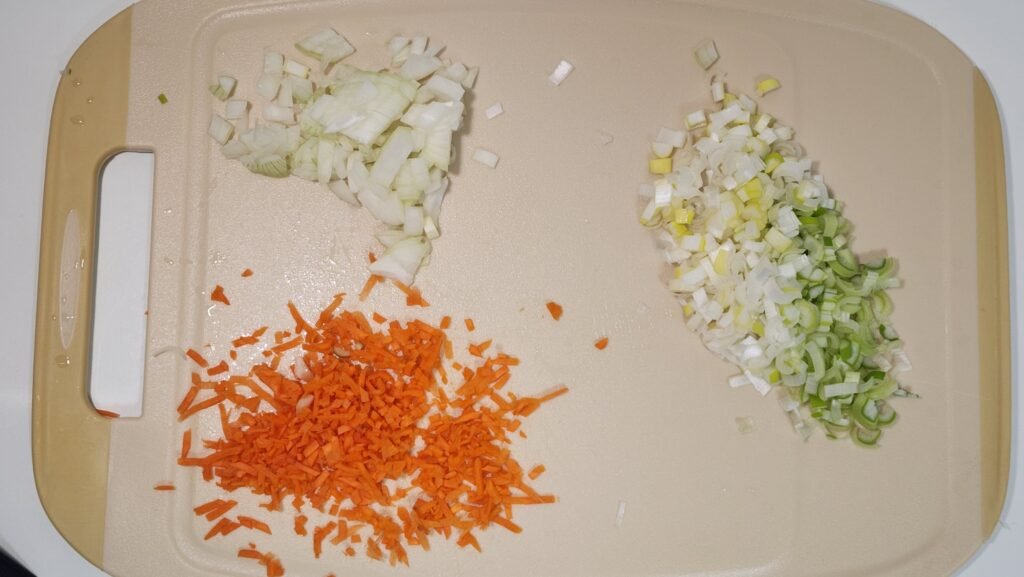 Finely chopped scallion, onion, and carrot for tteokgalbi.